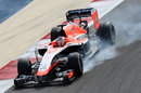 Jules Bianchi locks a brake in the Marussia