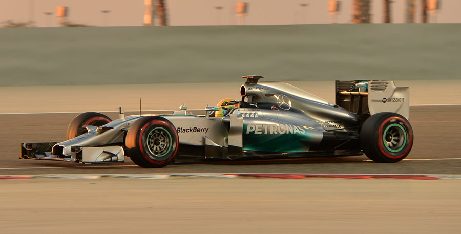 Lewis Hamilton driving under the lights 