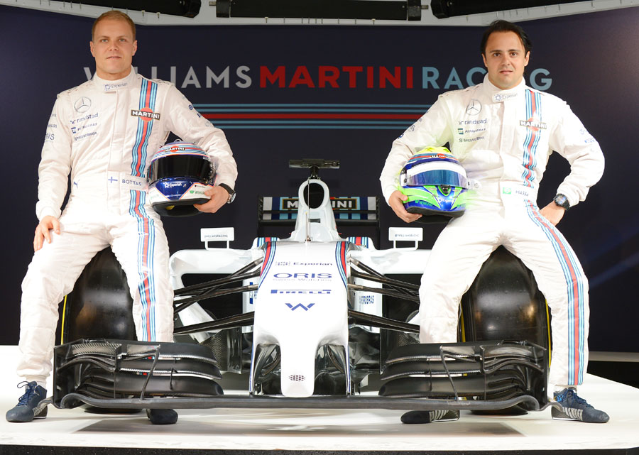 Valtteri Bottas and Felipe Massa pose with the Williams FW36