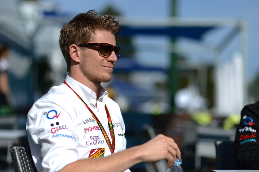 Nico Hulkenberg relaxes in the paddock