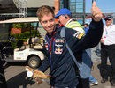 Sebastian Vettel arrives at the circuit with a cuddly kangaroo