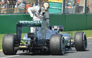 Lewis Hamilton steps out of his Mercedes after stopping on track with a sensor issue