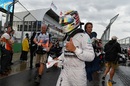 Lewis Hamilton gives the thumbs up after taking pole