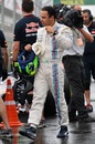 Felipe Massa walks through the pit lane at the end of qualifying