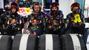 Red Bull mechanics wait for a pit stop
