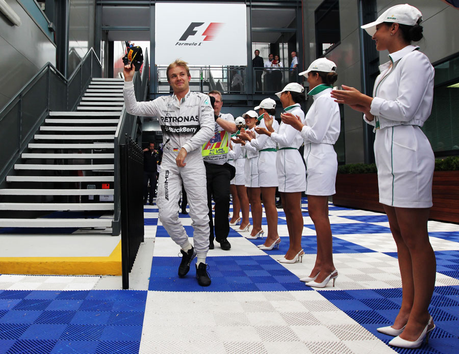 Nico Rosberg makes his way to the podium