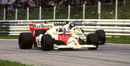 Alain Prost powers past a backmarker