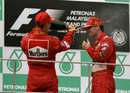 Michael Schumacher sprays Eddie Irvine after his victory