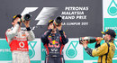 Jenson Button, Sebastian Vettel and Nick Heidfeld each enjoy a drink on the podium