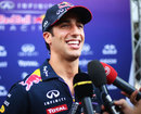 Daniel Ricciardo talks to the press