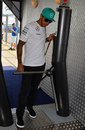 Lewis Hamilton arrives in Malaysia without an overzealous security guard in sight
