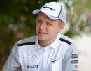 Kevin Magnussen talks to the press in the Sepang paddock