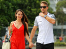 Jenson Button and his fiancée  Jessica Michibata arrive at the circuit