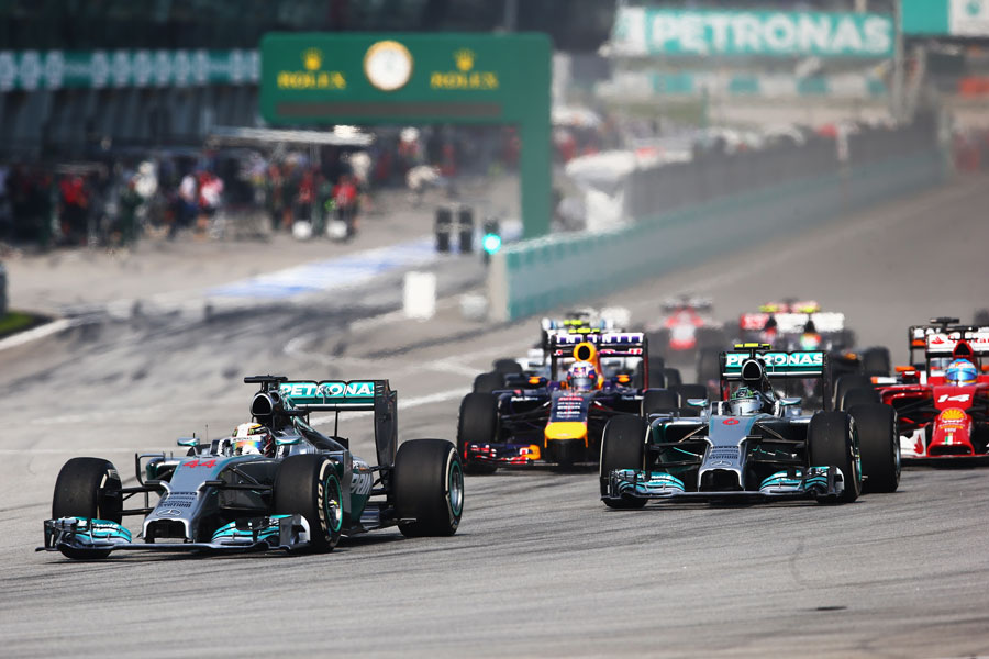 Lewis Hamilton leads the pack into Turn 1
