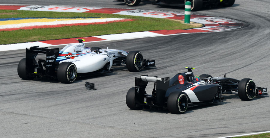 Valtteri Bottas and Esteban Gutierrez avoid debris on the track