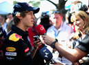 Sebastian Vettel talks to the media