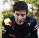 Mark Webber is interviewed in the paddock ahead of his home race