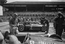 Juan Manuel Fangio prepares for the start of the German Grand Prix