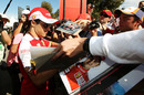 Felipe Massa signs autographs for the fans