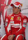 Felipe Massa waits in the Ferrari garage