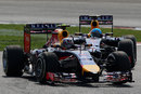 Daniel Ricciardo leads Sebastian Vettel through the opening sequence of corners