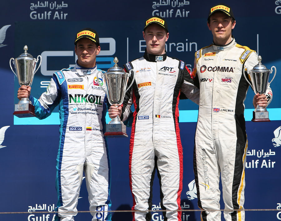 Stoffel Vandoorne celebrates victory on his GP2 debut with Julian Leal and Jolyon Plamer