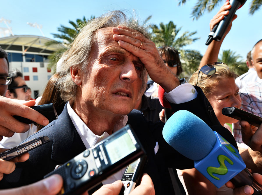 Ferrari president Luca di Montezemolo talks to media in the paddock
