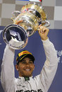 Lewis Hamilton lifts the trophy after winning in Sakhir