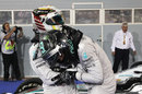 Nico Rosberg congratulates Lewis Hamilton on his victory in parc ferme