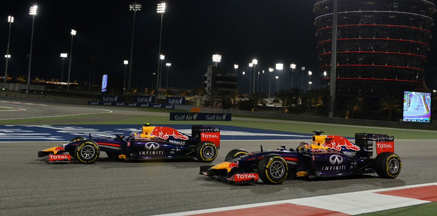 Daniel Ricciardo passes Sebastian Vettel into Turn 1