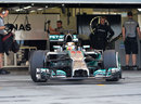 Lewis Hamilton exits the Mercedes garage on Wednesday morning