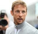 Jenson Button arrives in China ahead of the grand prix