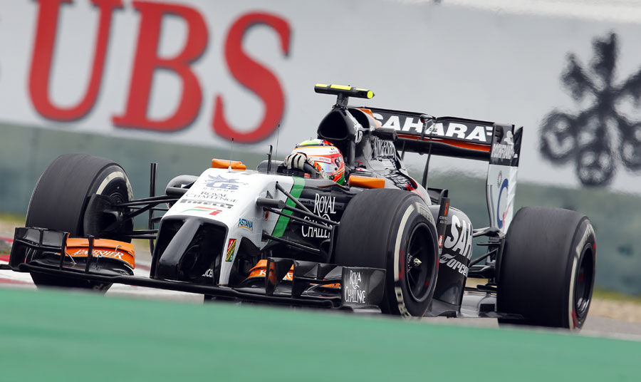 Sergio Perez navigates through a corner during Friday practice