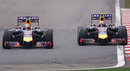 Daniel Ricciardo tries to pass Sebastian Vettel on the outside on the run up to Turn 1