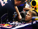 Sebastian Vettel prepares for the weekend in the Red Bull garage