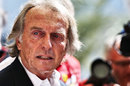 Ferrari president Luca di Montezemolo talks to media in the paddock