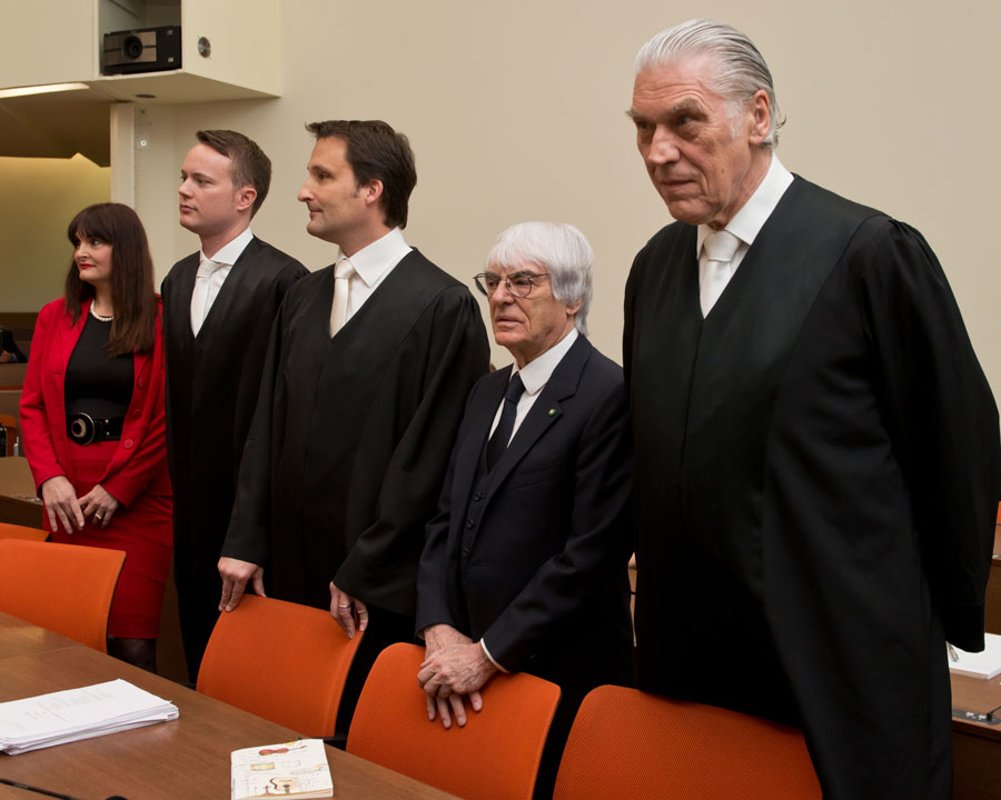 Bernie Ecclestone in court, flanked by lawyers  Andreas Weitzell (left) and Norbert Scharf