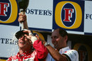 Ron Dennis sprays Ayrton Senna with champagne 