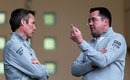 Sam Michael and Eric Boullier talk in the paddock