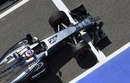 McLaren's Jenson Button prepares to leave the pit lane
