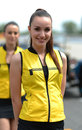 A grid girl waits for the start of the race