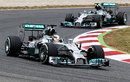 Lewis Hamilton leads Nico Rosberg early in the race