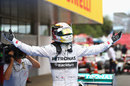 Lewis Hamilton celebrates in parc ferme after his victory