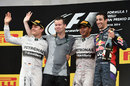 Nico Rosberg, Mercedes' Mike Elliot, Lewis Hamilton and Daniel Ricciardo pose on the podium