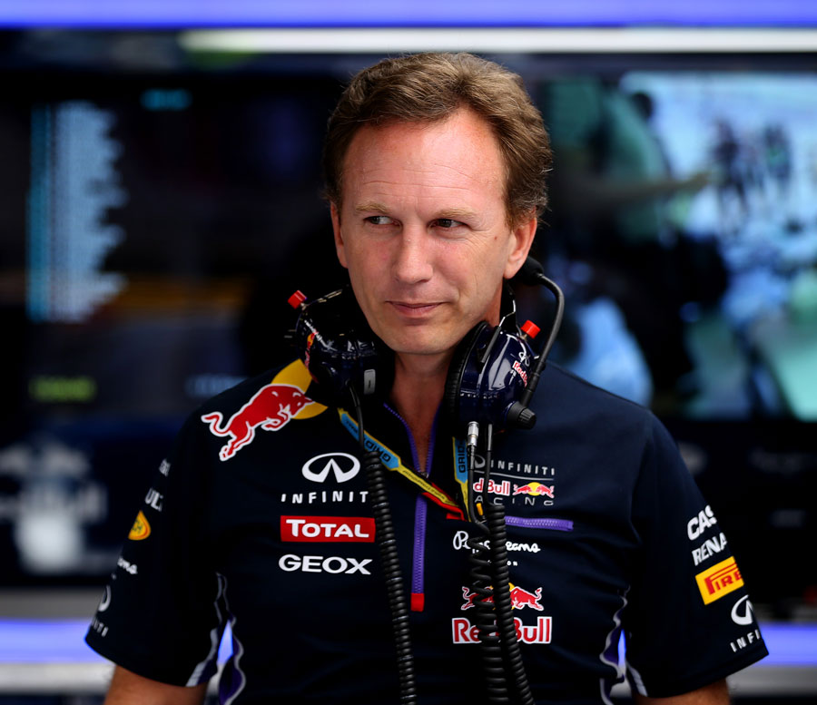 Christian Horner watches on in the paddock