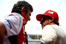 Ferrari team principal Marco Mattiacci talks to Fernando Alonso