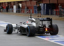 Jenson Button exits the pits on Tuesday morning