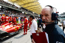 Adrian Newey takes a look at the Ferrari on the grid
