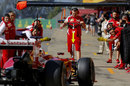 Kimi Raikkonen returns to the Ferrari garage for a practice pit stop