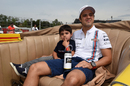 Felipe Massa takes his son with him on the drivers' parade